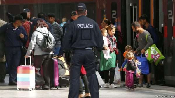 Беженцы и германская полиция